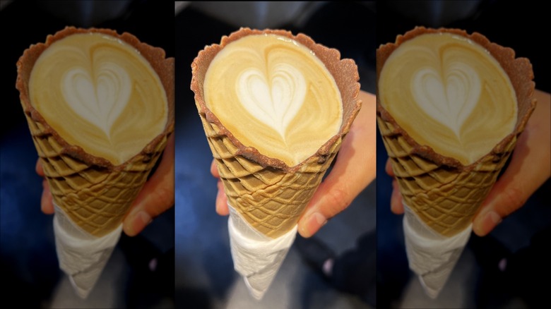 waffle cone coffee in hand