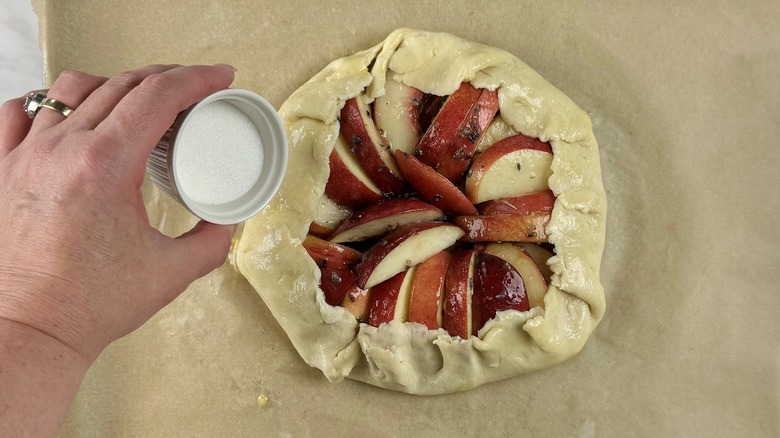 sprinkling galette crust with sugar