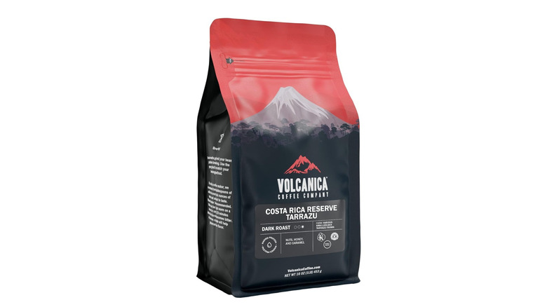 A single packet of Volcanica's Tarrazu Reserve Dark Roast coffee on a white background