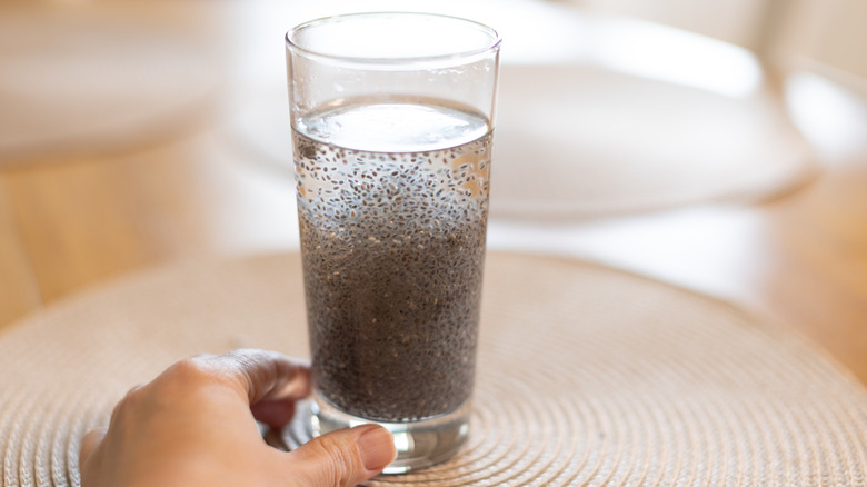 Chia seeds in glass of water