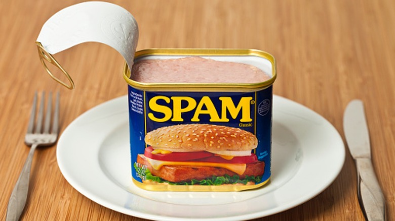 open can of spam on plate