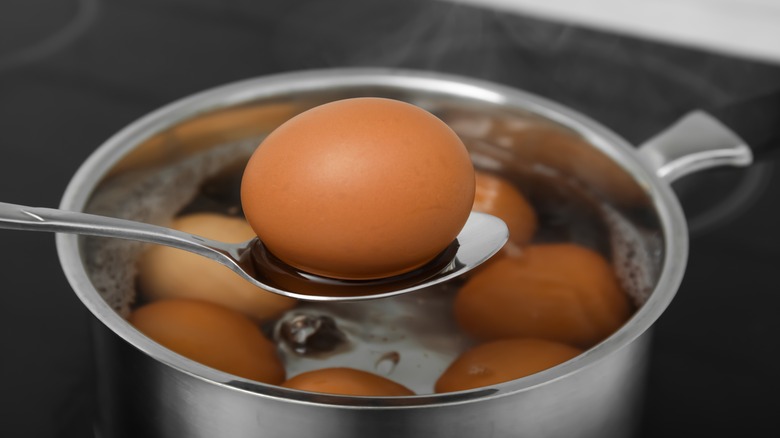 A pan of boiling eggs