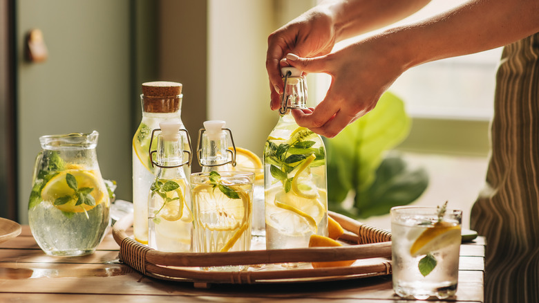 capping bottle of infused water