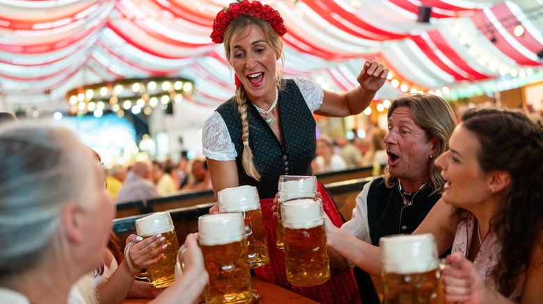 Drinking beer and singing at Oktoberfest