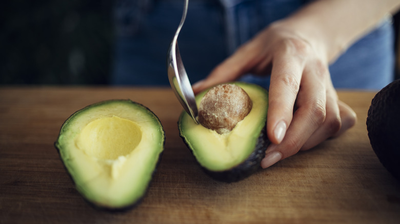 removing pit from avocado