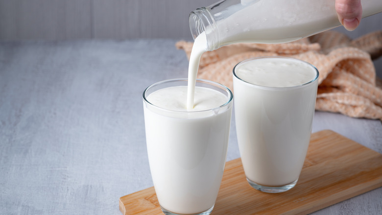 pouring buttermilk into glasses