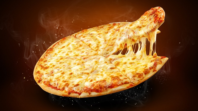 cheese pizza suspended in midair