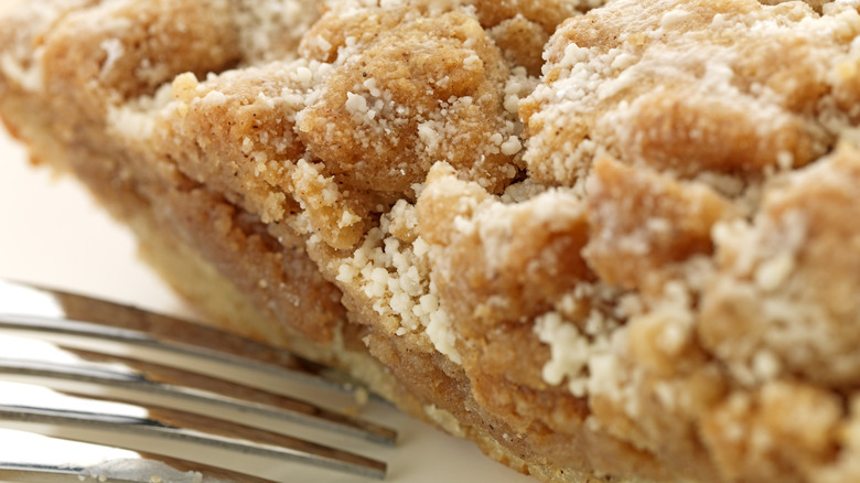 Close up of coffee cake with a fork