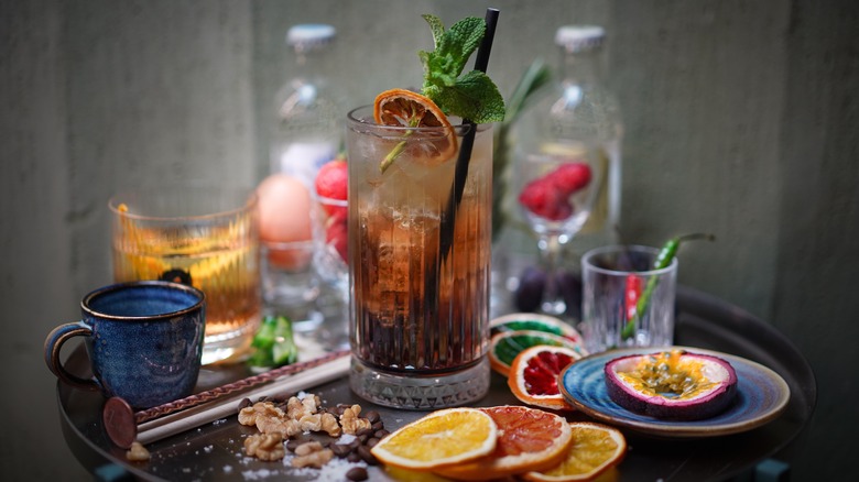 Modified Long Island iced tea with various garnishes