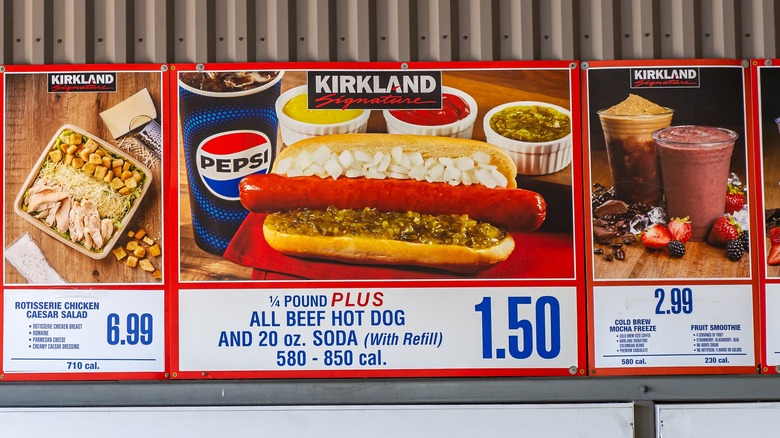 Costco food court menu with hot dog in center.