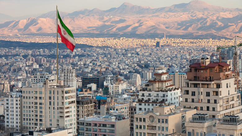 Iranian flag over Tehran