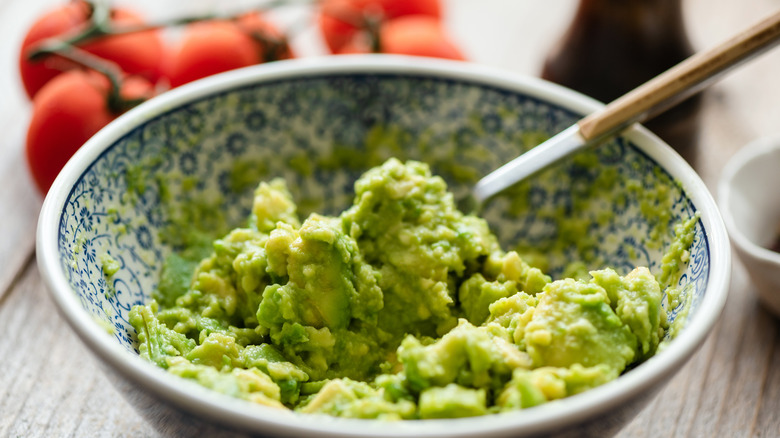 mashed avocado in a bowl