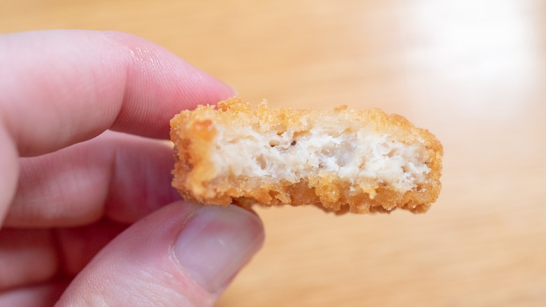 chicken nugget with bite taken out of it