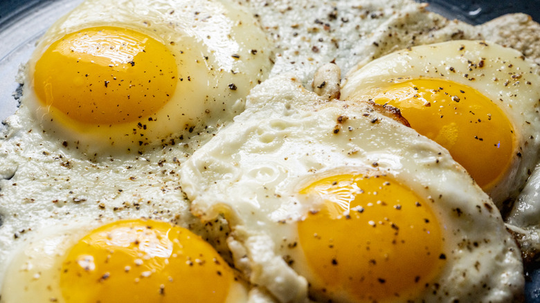 Sunny side up eggs in a pan