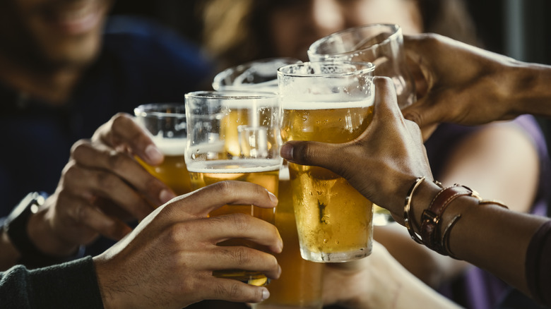 cheers with beer glasses