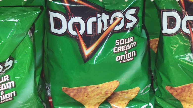 Store shelf with Doritos' Sour Cream & Onion tortilla chips