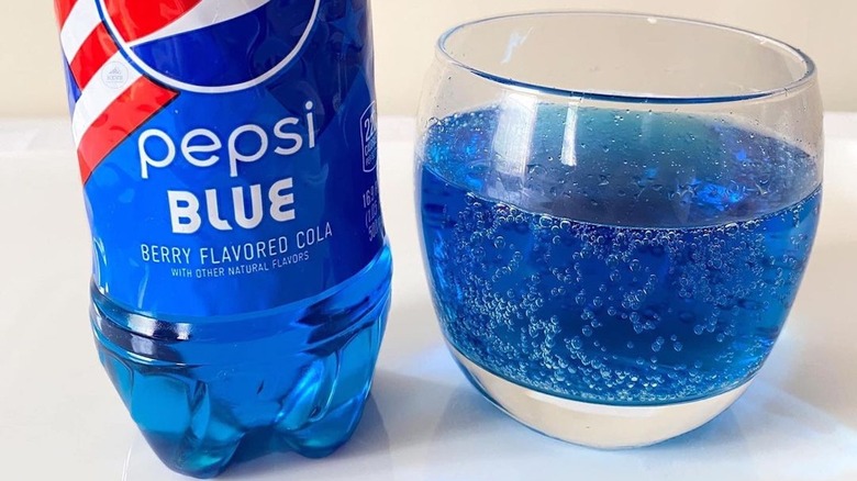 Pepsi blue in bottle and glass