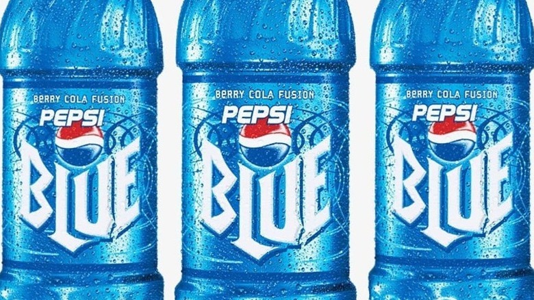 Pepsi Blue in glass with bottle