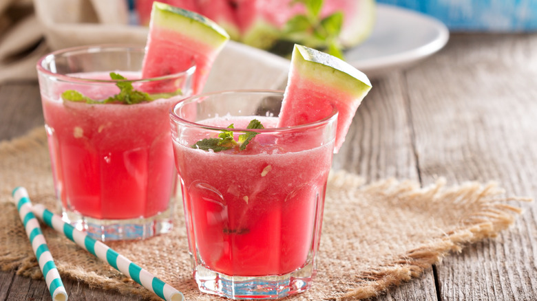 Summer drinks garnished with watermelon sticks