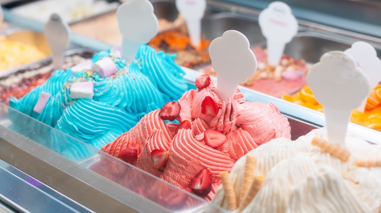 colorful gelato on display in gelateria