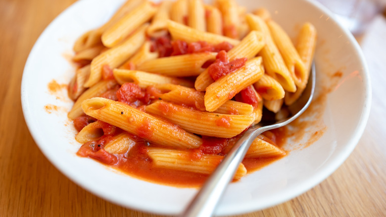 Penne with runny tomato sauce