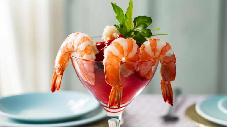 Shrimp cocktail displayed in martini glass