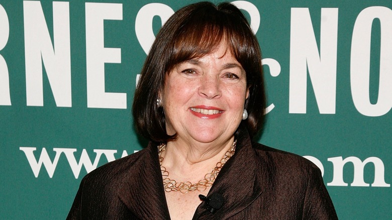 Ina Garten posing for picture in front of Barnes & Noble sign