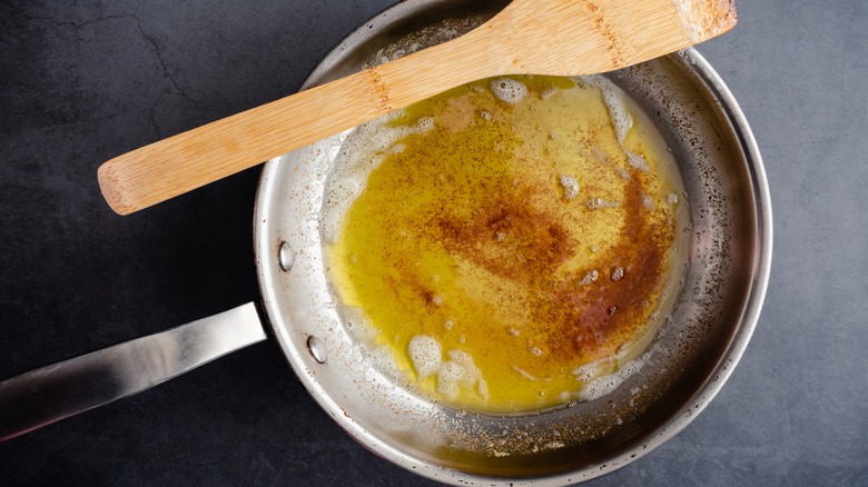 Overhead view of brown butter in a skillet