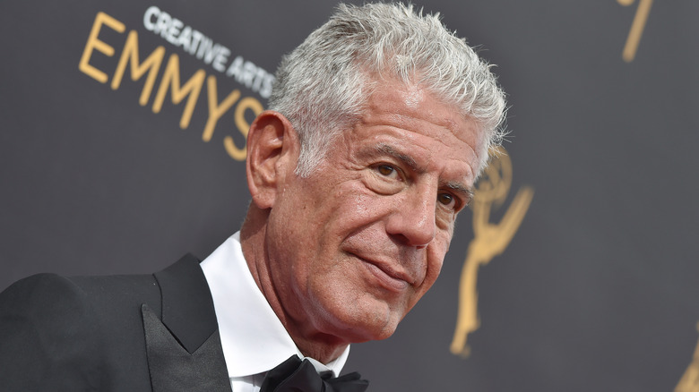 Anthony Bourdain posing at the Emmys