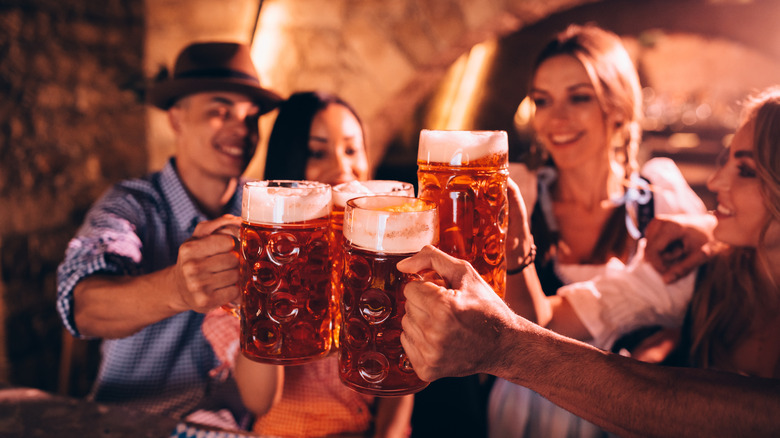 a group of people enjoying German beer