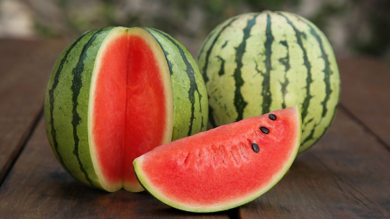 Several triangular slices of red watermelon.