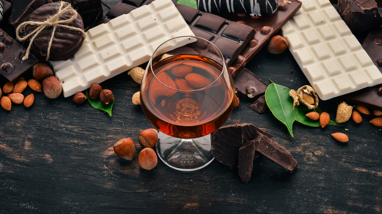 Bourbon surrounded by chocolate and nuts