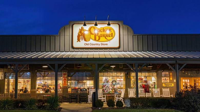 Cracker Barrel exterior at night with illuminated sign