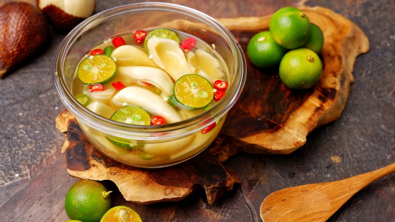Pickle juice with lemons, red chillies and onions