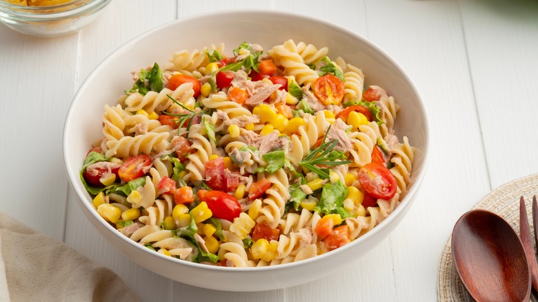 Pasta salad with vegetables white bowl