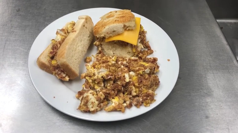 Corned beef egg scramble served on a plate.