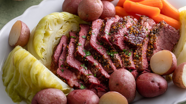 A St. Patrick's Day platter filled with corned beef and vegetables.