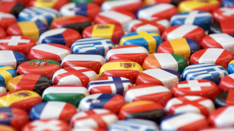 bottle caps with flags of European countries printed on them