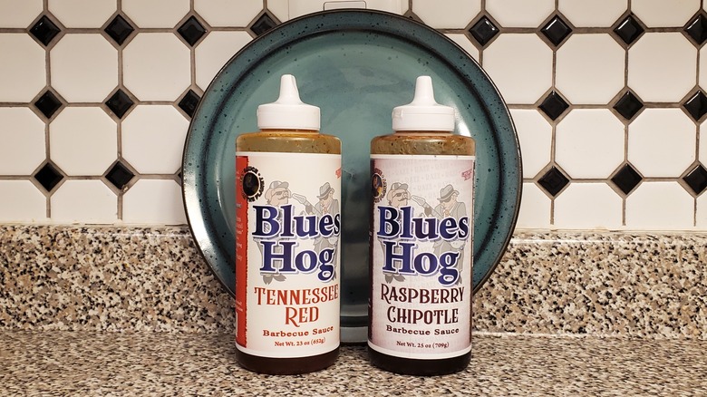 Blues Hog Raspberry Chipotle and Tennessee Red barbecue sauce bottles