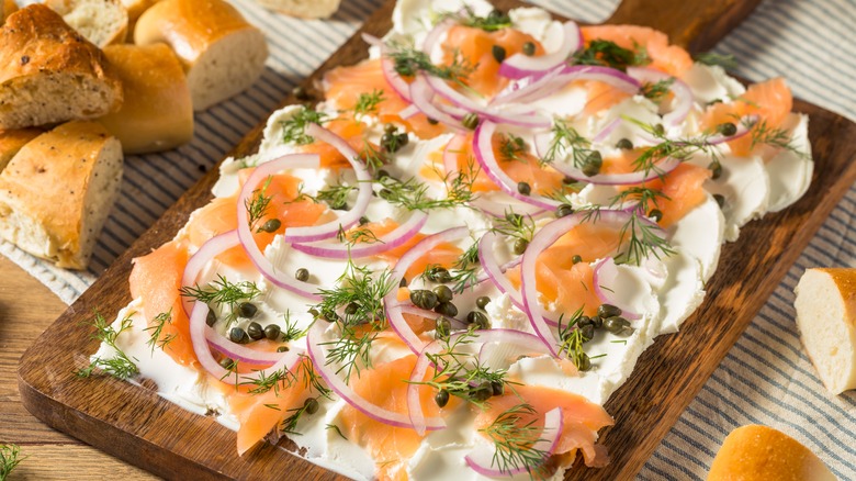 Board with lox, cream cheese, bagels