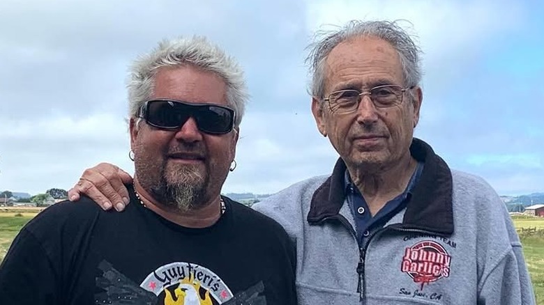 Guy Fieri standing with his late father, Jim Ferry