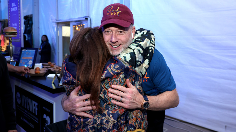 Rachael Ray hugging a friend