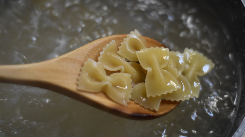 Al dente pasta in boiling water