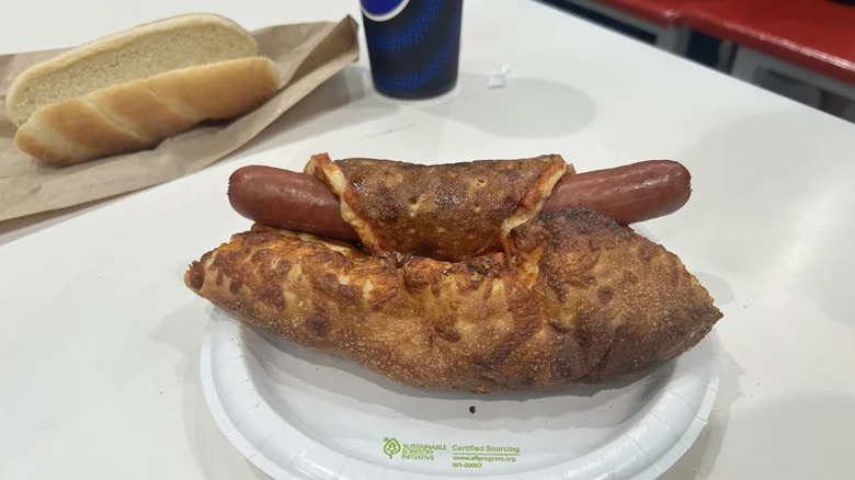 Costco pizza wrapped around hot dog