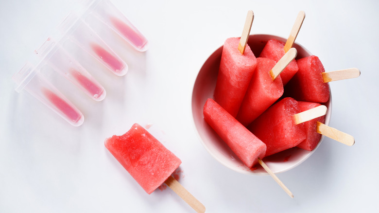 Watermelon popsicles out of their mold
