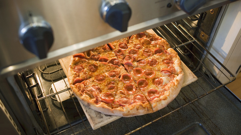 Frozen pizza cooked in the oven