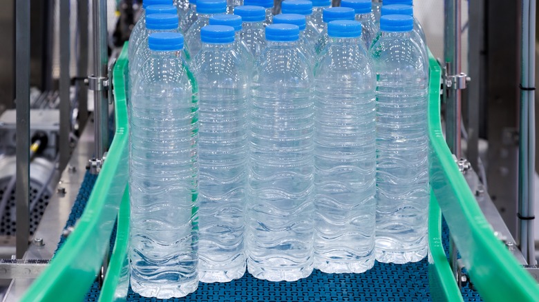 Plastic water bottles on conveyor belt