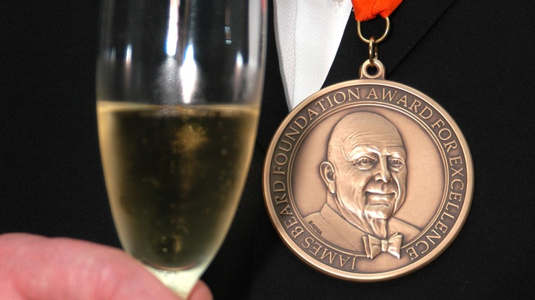 James Beard Award medal with champagne