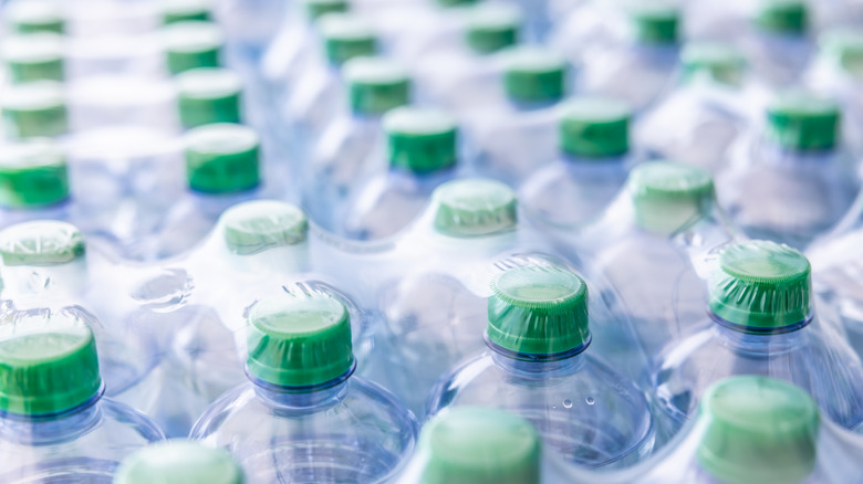 plastic water bottles in plastic wrap