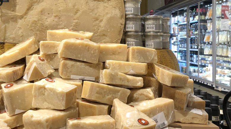 stack of cheese inside a whole foods